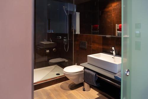 Koupelna v ubytování Hotel Quers Inn