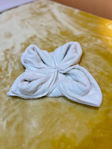 a towel on top of a piece of dough at Kelany Palace Hotel Aswan in Aswan