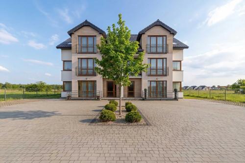 Bright Air-Conditioned Apartments with Parking and Terrace or Balcony by Noclegi Renters