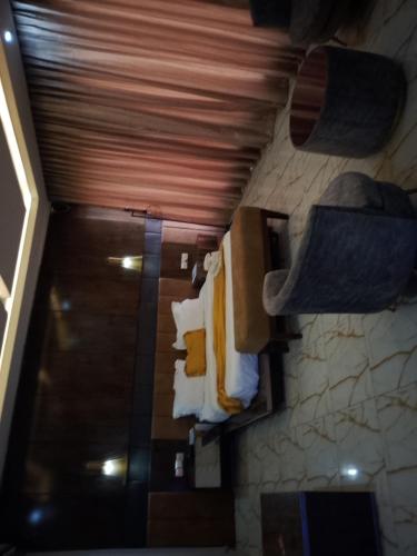 an overhead view of a room with boxes and towels at Mar'maris Residence Hotel in Owerri