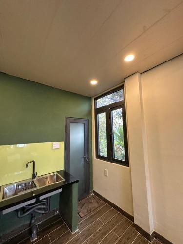 an empty bathroom with a sink and a mirror at The mountain Seaview in Vung Tau