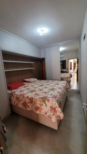 a bedroom with two beds in a room at Casa Tecnoshow 2026 in Rio Verde