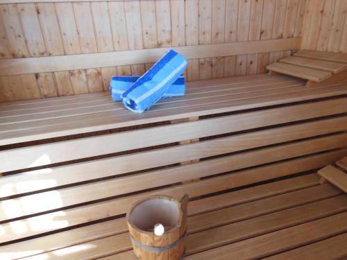 an inside of a sauna with a bench and a tube at Biohof Ebenbauer in Waidhofen an der Ybbs