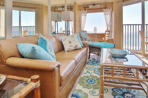 a living room with a couch and a table at Belleair Beach Club 315 in Clearwater Beach