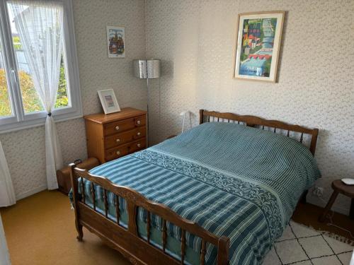 Llit o llits en una habitació de Maison ALCEMA