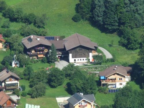 an aerial view of a house on a hill at Ferienwohnungen am Bauernhof in Rangersdorf