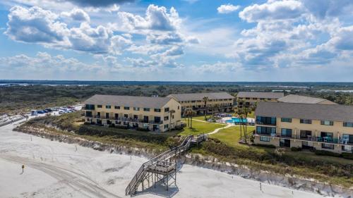 an aerial view of the beach at the resort at St Augustine Beachfront Condo with Ocean Views in Saint Augustine Beach