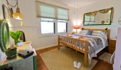 Postel nebo postele na pokoji v ubytování Hale Kawehi BnB Guesthouse