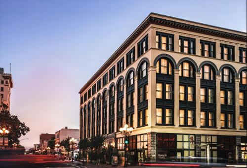 a large building on the corner of a street at Granger Hotel San Diego Downtown Gaslamp Quarter, a Member of Design Hotels in San Diego