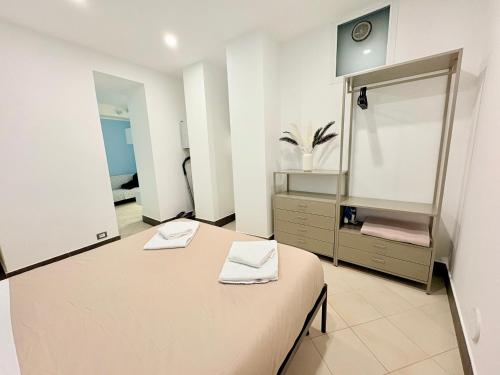 a bathroom with a table and a mirror at La casetta di Monterosso in Monterosso al Mare