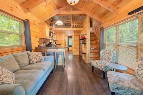 a living room and kitchen in a tiny house at Eden Cabin Forested Tiny Home On Lookout Mtn in Chattanooga
