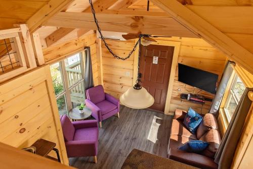 an overhead view of a living room in a tiny house at Maggie Cabin Enjoy Nature From A Forest Hot Tub in Chattanooga