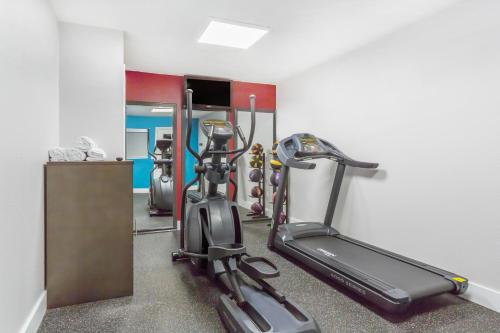 a room with a gym with a treadmill at Ramada by Wyndham Monterey in Monterey