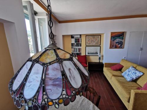 a stained glass chandelier in a living room at Due balconcini sul mare in Santa Margherita Ligure