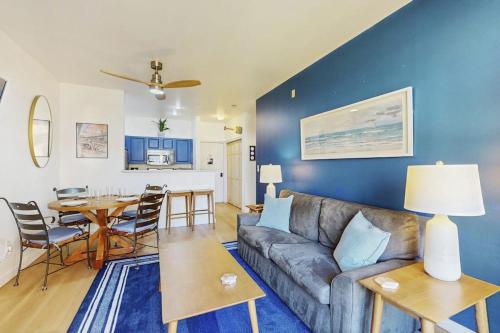 a living room with a couch and a table at Sapphire of Belltown Court in Seattle