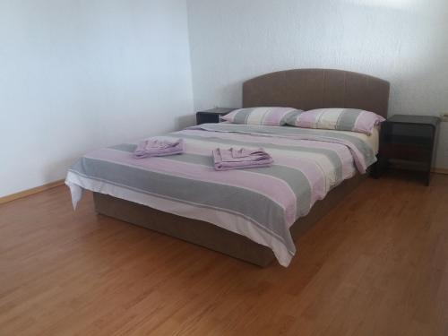 Posteľ alebo postele v izbe v ubytovaní Apartments Cajic