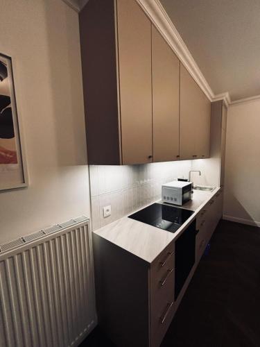 Foto Cozy and quiet apartment in the city centre 5
