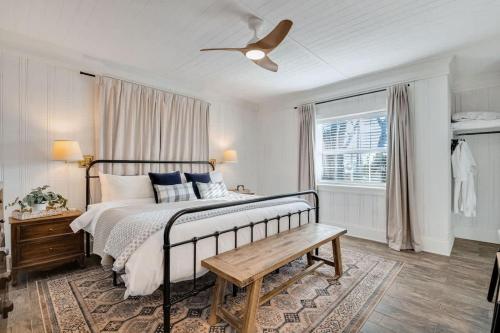 a bedroom with a bed and a ceiling fan at 1- Lookout Mountain Cottage in Lookout Mountain