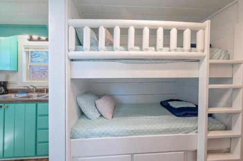 a bunk bed in a childs bunk room at Sophie Cabin National Forest Tiny Cabin in Chattanooga