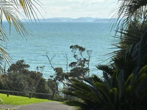 a view of the ocean from a house at The Beach House in Red Beach