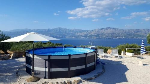 Family friendly house with a swimming pool Postira, Brac - 11742