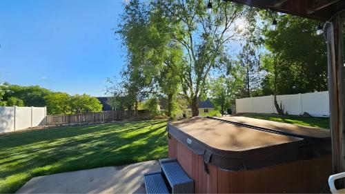 a view of a yard from the porch of a house at Lighthouse Basement Guest Suite in Provo