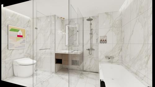 a bathroom with a shower and a toilet and a sink at Charis Hotel in Incheon