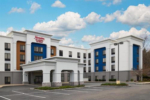 a rendering of the front of a hotel with a parking lot at Hampton Inn and Suites Parsippany/North in Parsippany