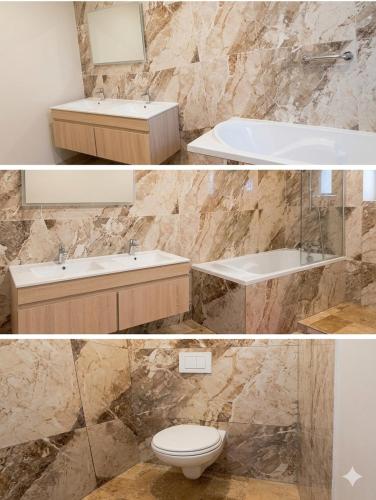 a bathroom with a sink and a toilet and a tub at L oxygène ardéchois gîte 3 in Ruoms