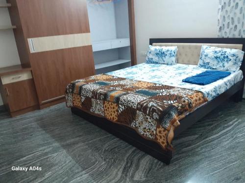 a bedroom with a bed in a room at XD Hotels 101 in Bangalore