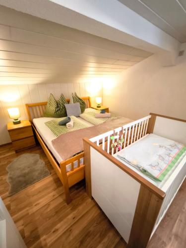 a small room with a bed and a couch at Riverside Appartements in Lieserbrücke