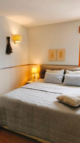 a bedroom with a large bed in a room at Todos Y Tonya in Archidona