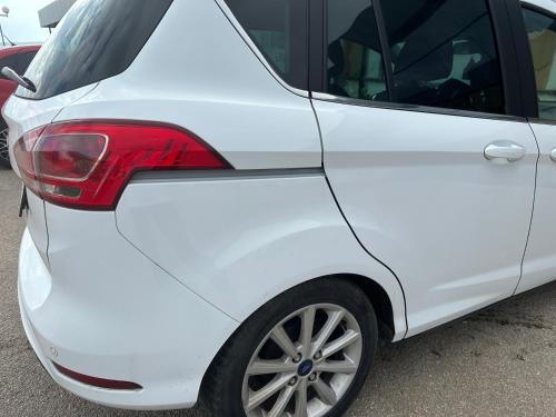 a white car parked in a parking lot at Rent a Car Cipo in Kumanovo