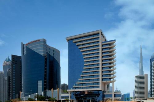 a view of a city skyline with tall buildings at The First Collection Business Bay, Dubai, a Tribute Portfolio Hotel in Dubai
