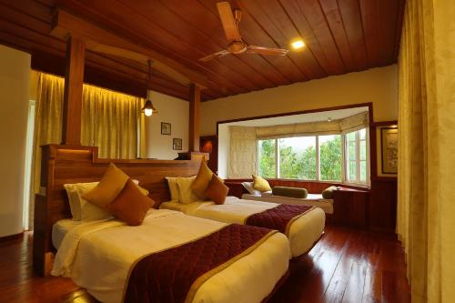 Cama o camas de una habitación en SpiceTree Munnar