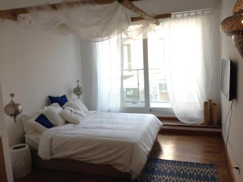 Posteľ alebo postele v izbe v ubytovaní Industia Loft Apartment