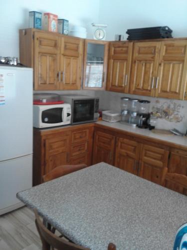 Fotografija u galeriji objekta Ruxmian Lodge u gradu Strand