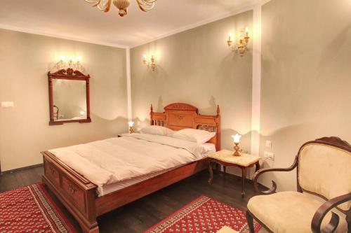 Ένα ή περισσότερα κρεβάτια σε δωμάτιο στο Hotel Evmolpia