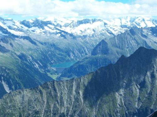 an aerial view of a mountain range with snow covered mountains at Gästehaus Flörl in Gerlosberg