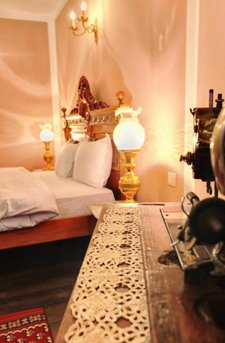 Ένα ή περισσότερα κρεβάτια σε δωμάτιο στο Hotel Evmolpia