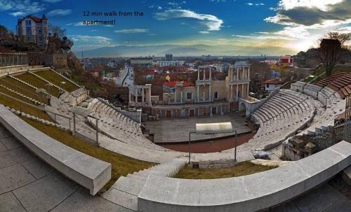 an amphitheater with a view of a city at City Garden Studio in Plovdiv