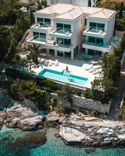 an aerial view of a villa with a swimming pool at Villa Mila in Selca