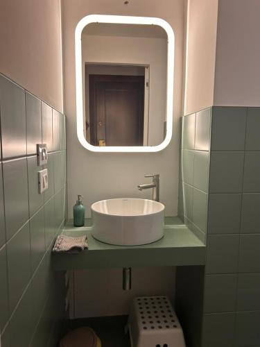 a bathroom with a sink and a mirror at Mi&Ti Bed&Breakfast in Vicenza