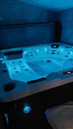 a blue table with a tableablish at Love room les pins in Le Muy