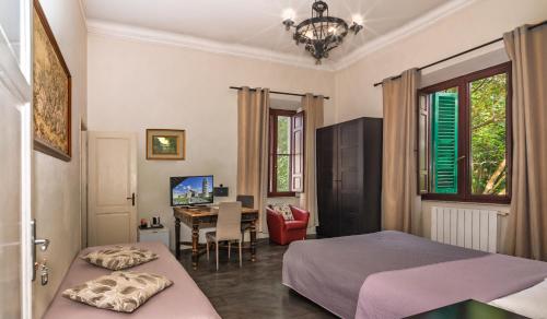 Llit o llits en una habitació de B&B Villa Regina