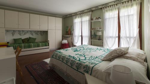 Postel nebo postele na pokoji v ubytování B&B La Rampichina