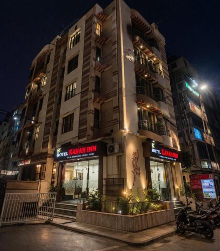 a large building with motorcycles parked in front of it at HOTEL KANAN INN in kolkata