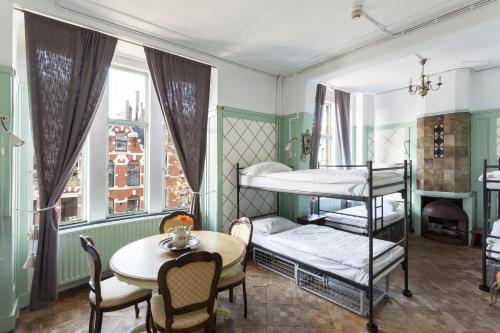 Ένα ή περισσότερα κρεβάτια σε δωμάτιο στο Hostel ROOM Rotterdam