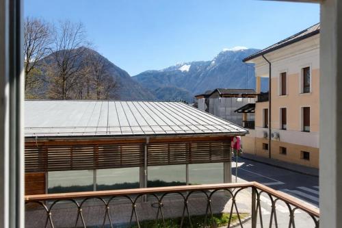 a view from a balcony of a building with mountains in the background at EDI APP Bovec Center-Free Parking & Mountain View in Bovec
