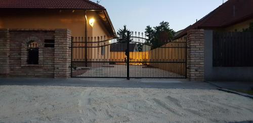 a black gate in front of a house at Anita in Budapest